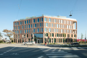 A squat brick building designed by Henning Larsen