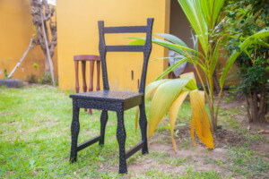 A chair carved from wood at design week lagos