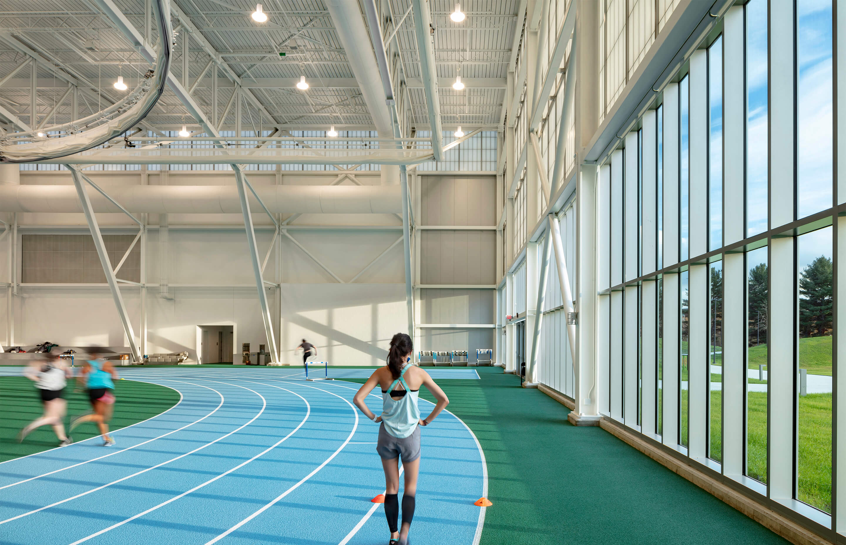 inside of an athletics center with glass walls