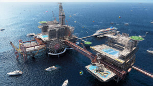 rendering of theme park off the coast of saudi arabia atop a series of oil platforms