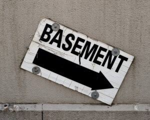 A sign reading basement, part of a mass timber building code change