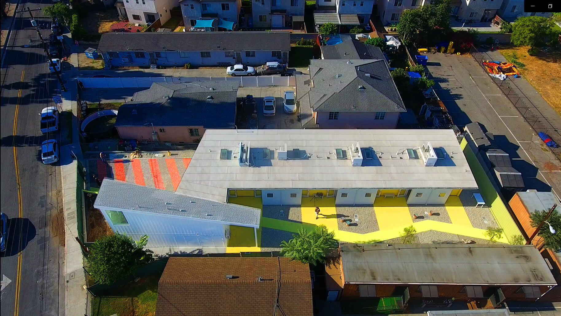aerial view of a colorful, small housing complex