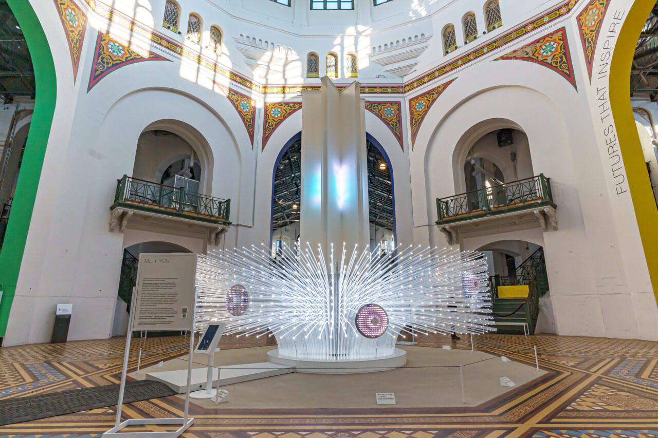 a monumental light installation within a historic rotunda