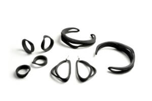 A collection of jenny wu designed jewelry in black