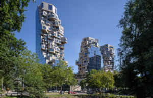 jagged towers clad in natural stone and glass