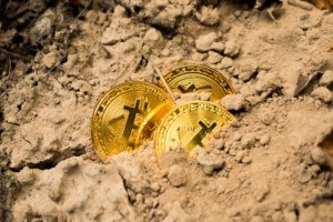 El salvador will build a bitcoin city, seen here are bitcoin in the dirt