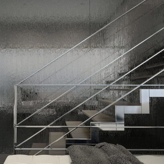 a stairwell with a glass surface