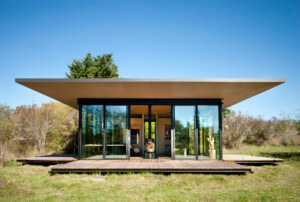 the False Bay Writer’s Cabin, designed by olson kundig with shutters