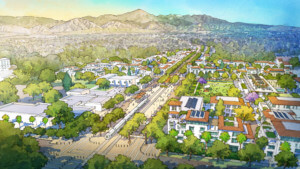 watercolor rendering of a sprawling transit village framed by mountains