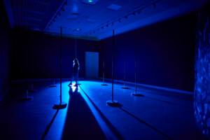 a person walks through an art installation by a turner prize winner