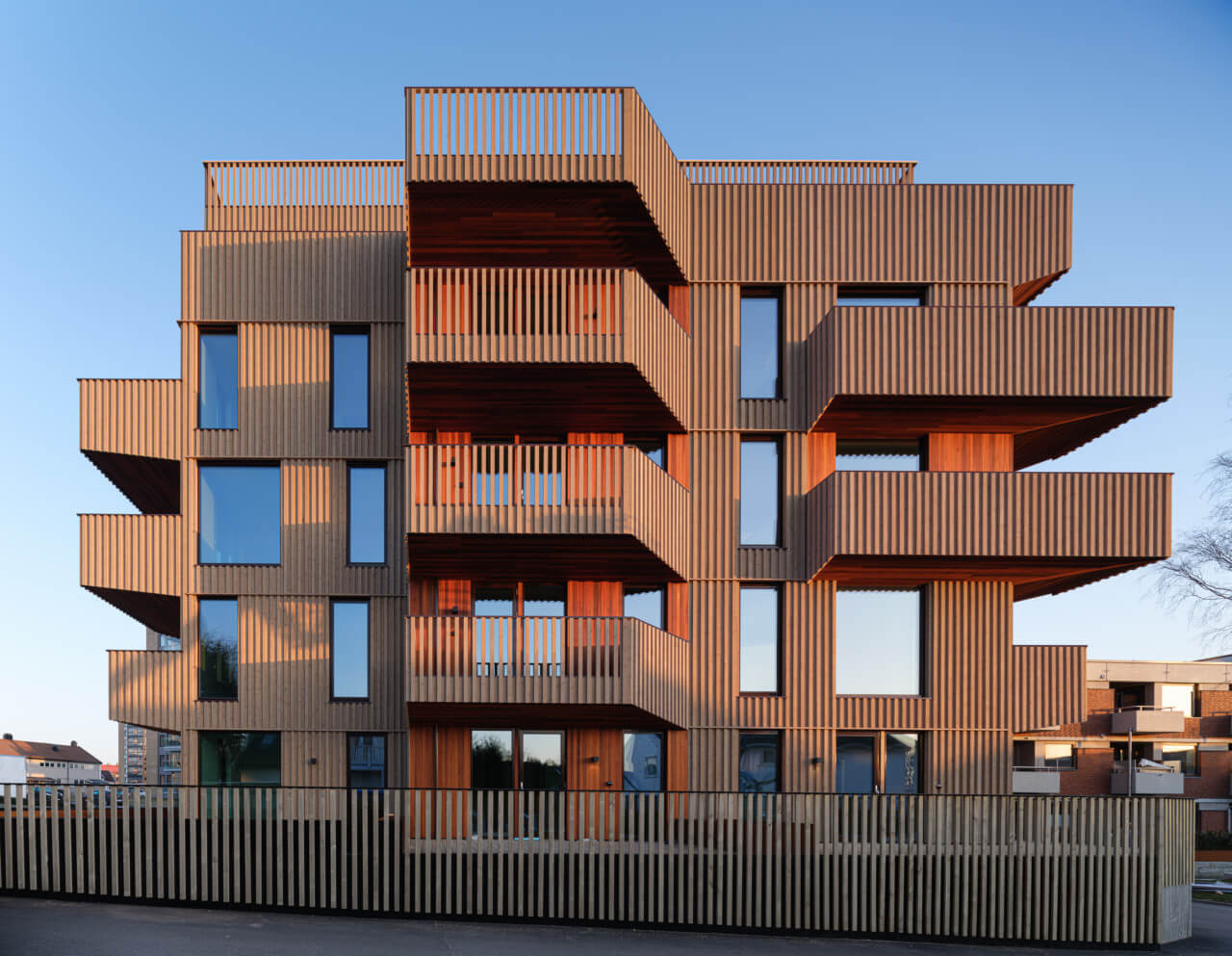 elevation of a timber-clad apartment building