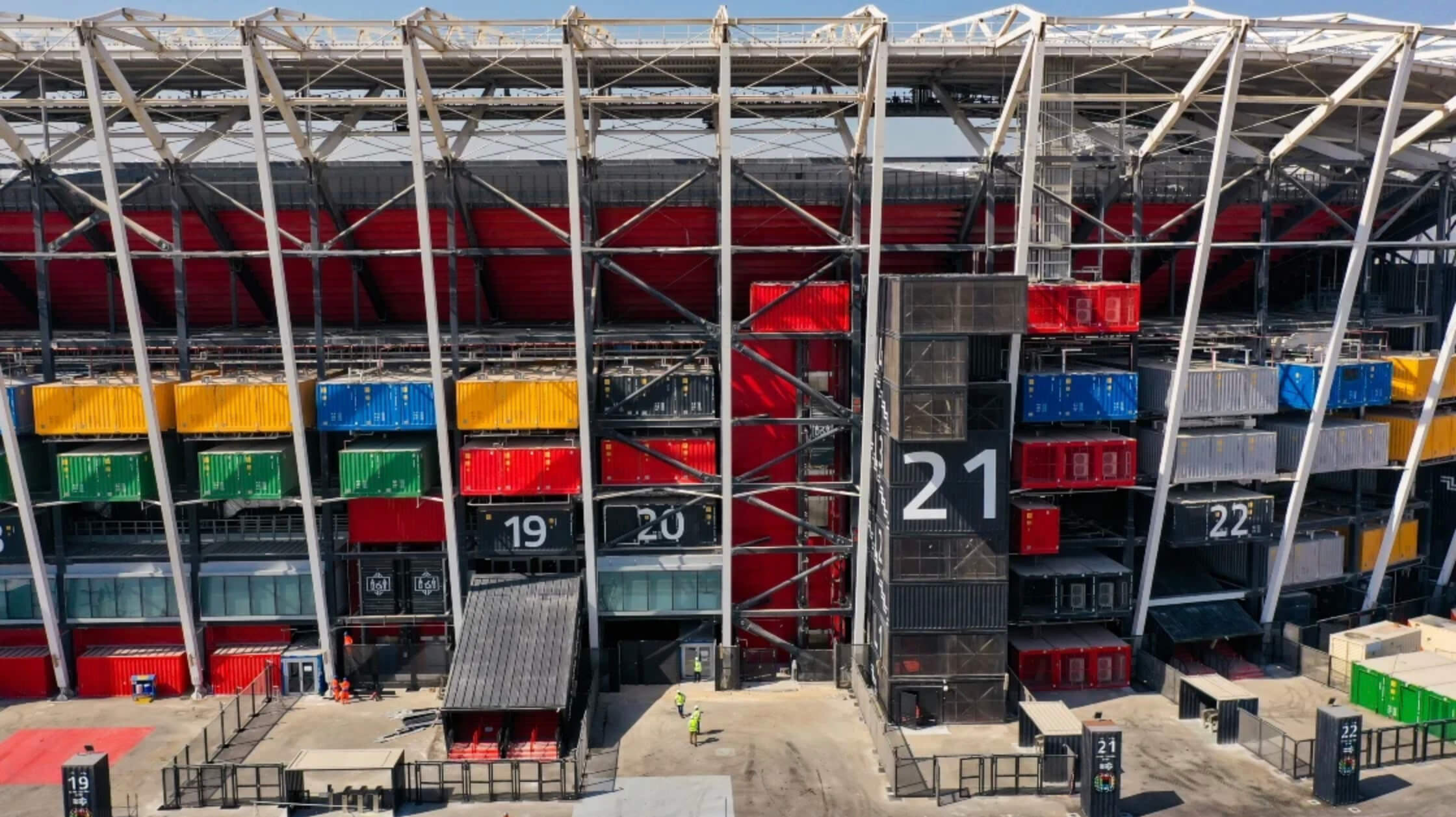 a stadium built from shipping containers