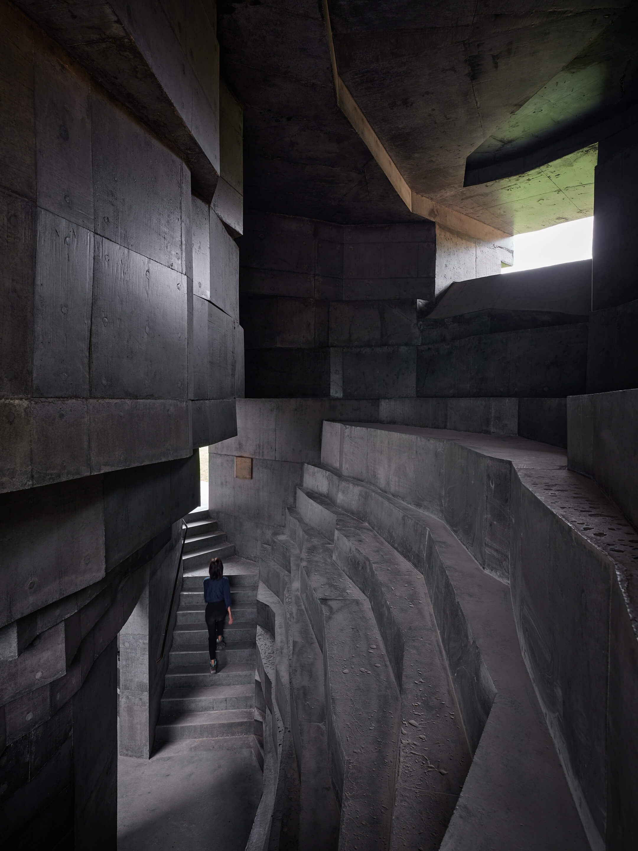 concrete staircase between two layers of rocky concrete