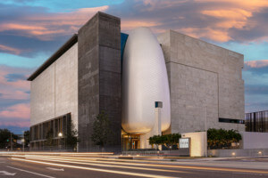 the Museum of the American Arts and Crafts Movement, a stone volume with a towering white 