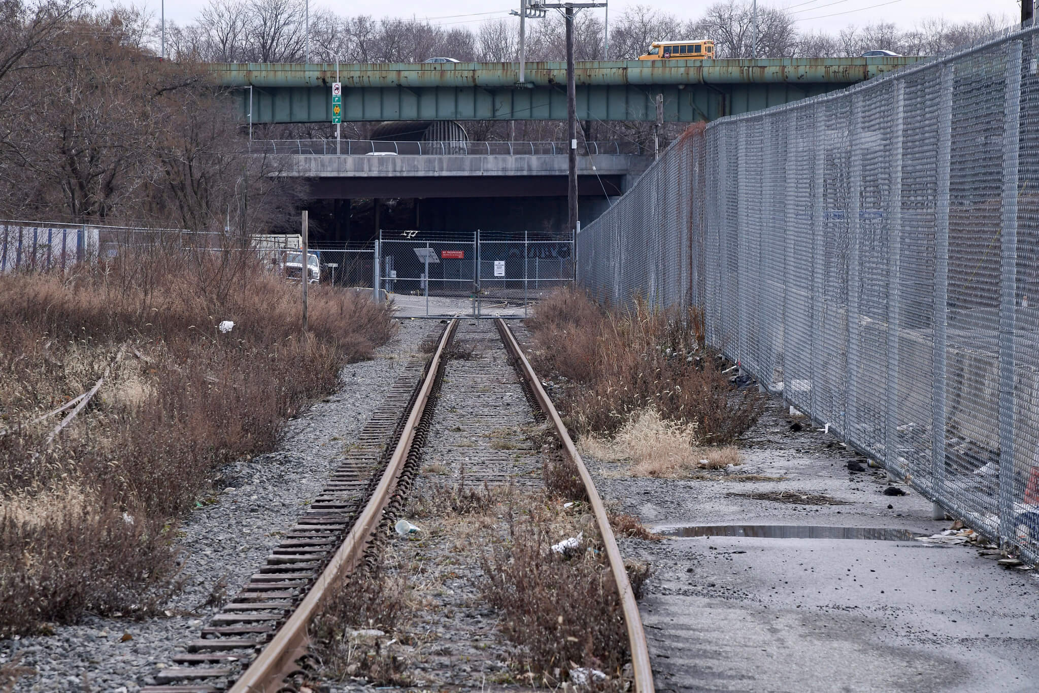 empty train tracks in an industrial area