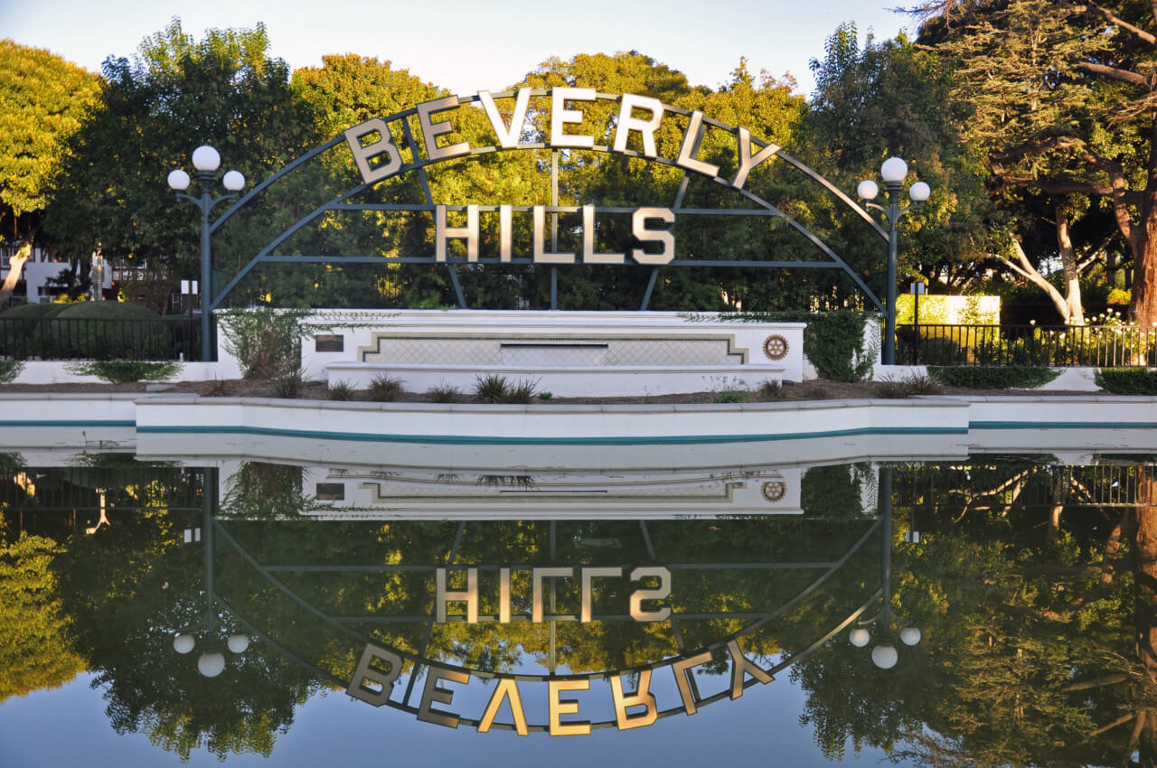 a large beverly hills sign at beverly gardens park, the supposed site of Frieze los angeles