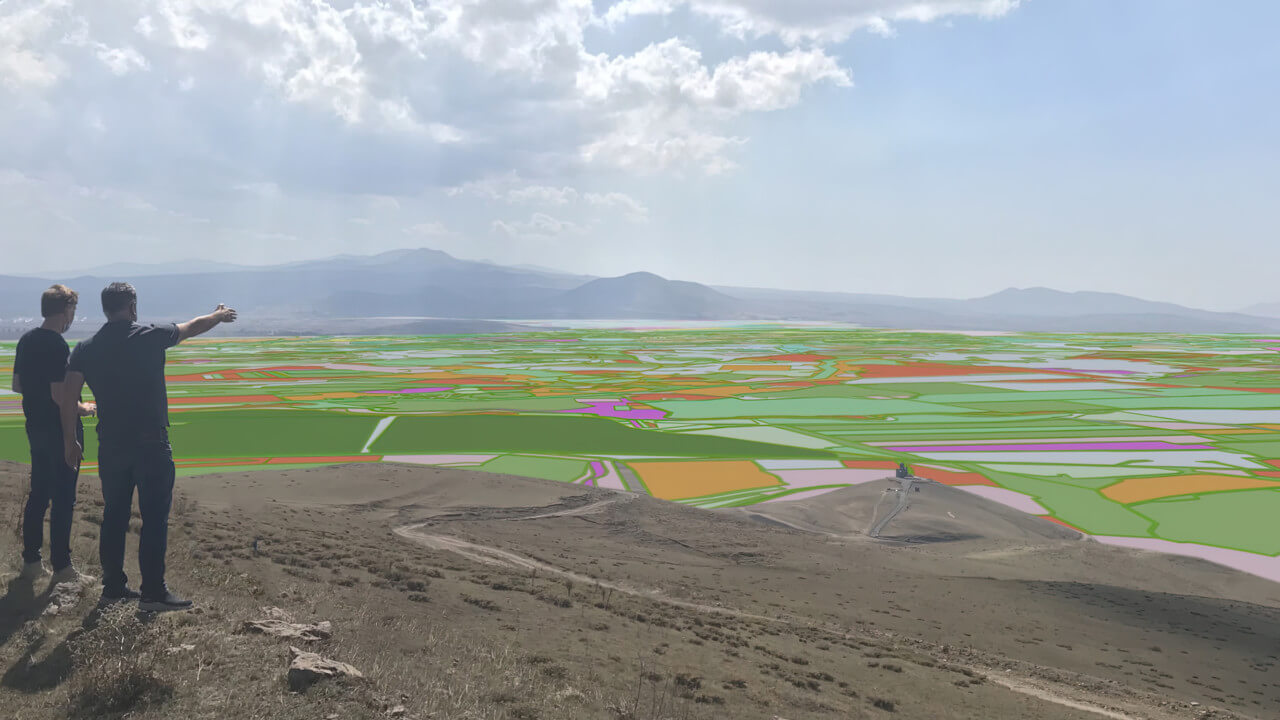 birds-eye rendering of a sprawling agricultural landscape