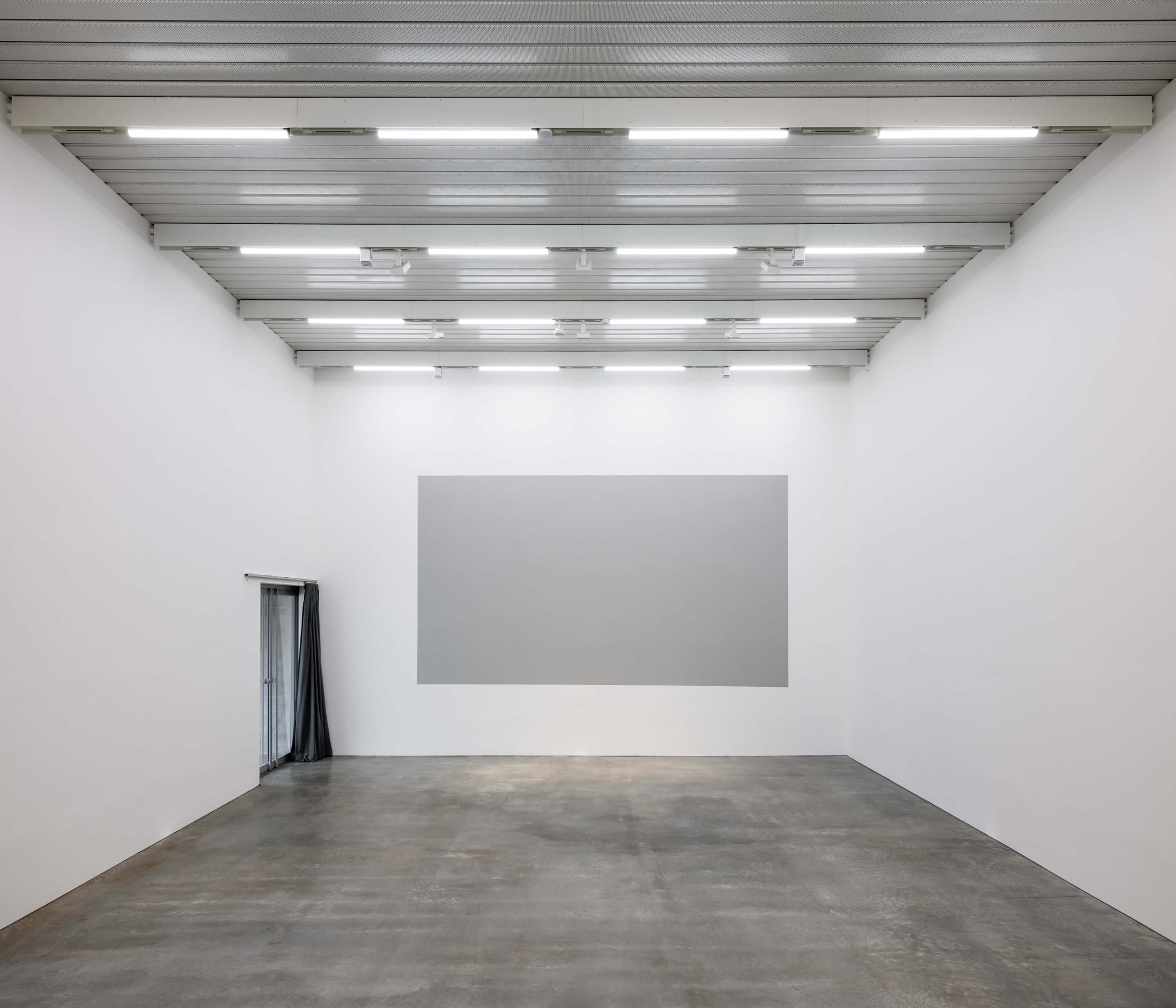 Inside of a white walled gallery space