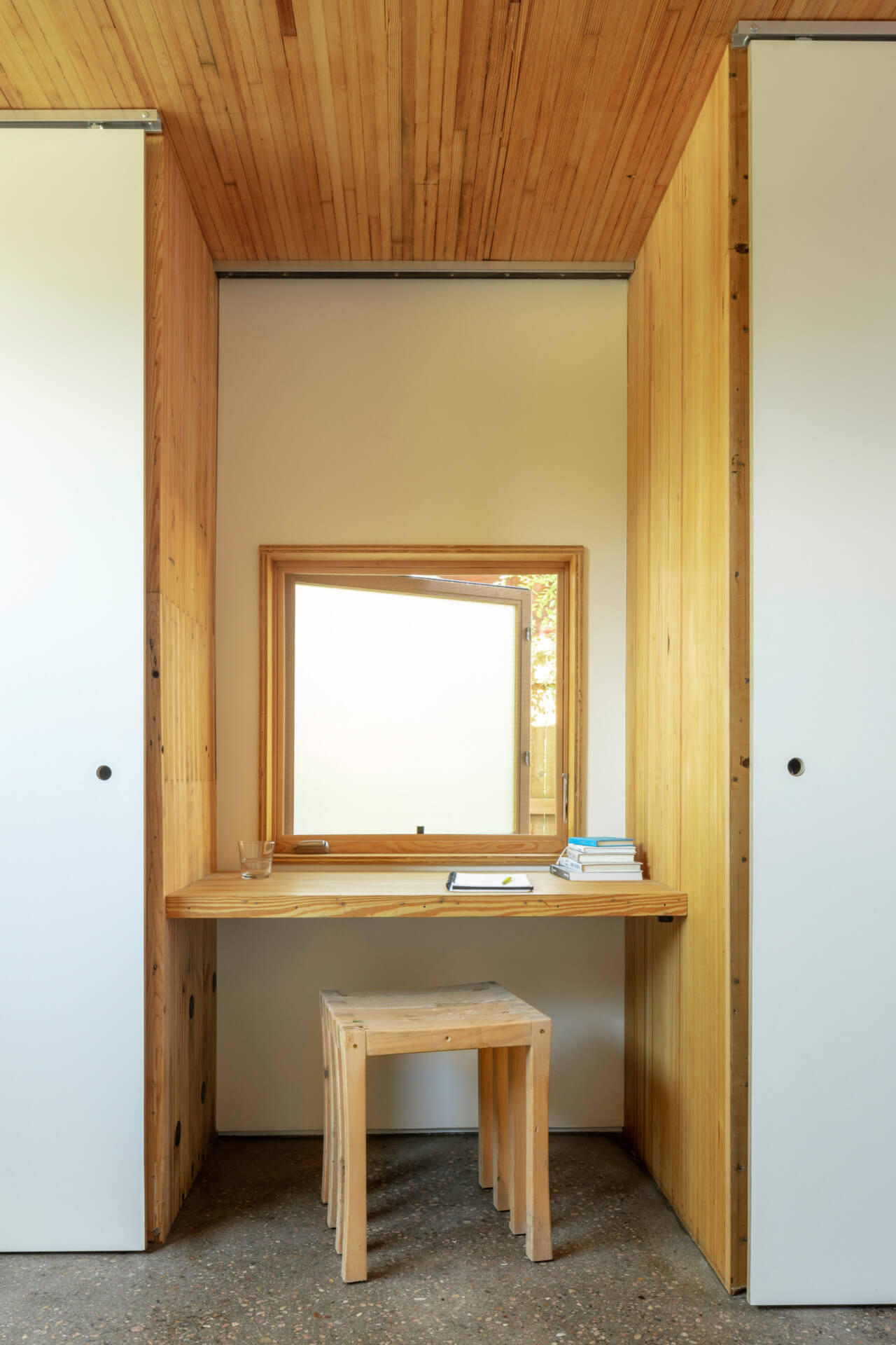An office nook framed with wood