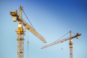 The 2021 Architecture Billings Index closed out on a high note; seen here are two cranes