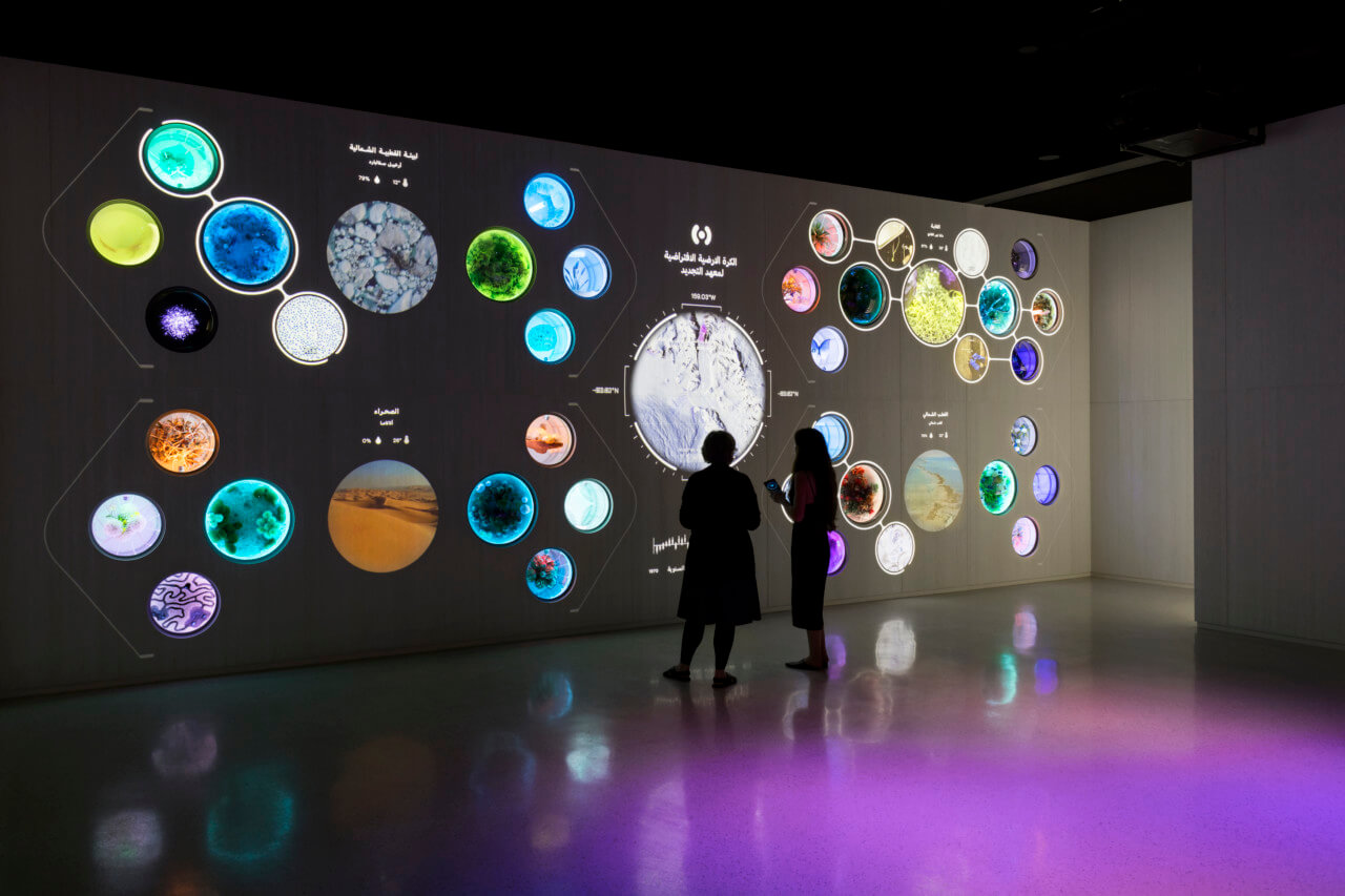 an immersive museum exhibition showing planets