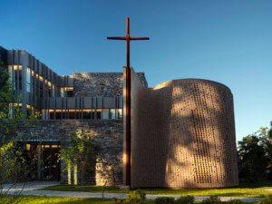 a brick cylinder church in the sunlight, which will be shown at facades+ philadelphia