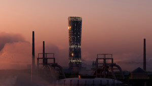 ostrava tower at dusk amid the smoke of industry