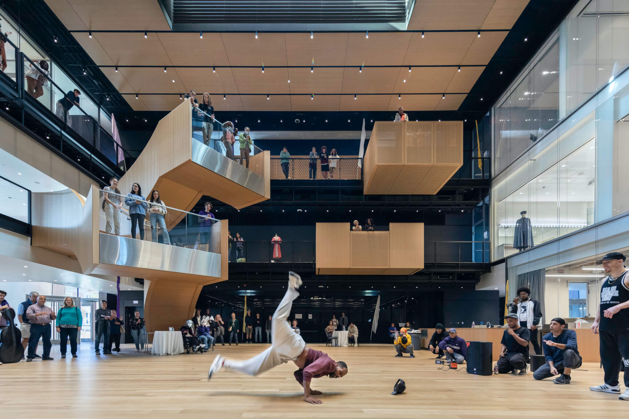 view of a breakdancing performance in a large venue