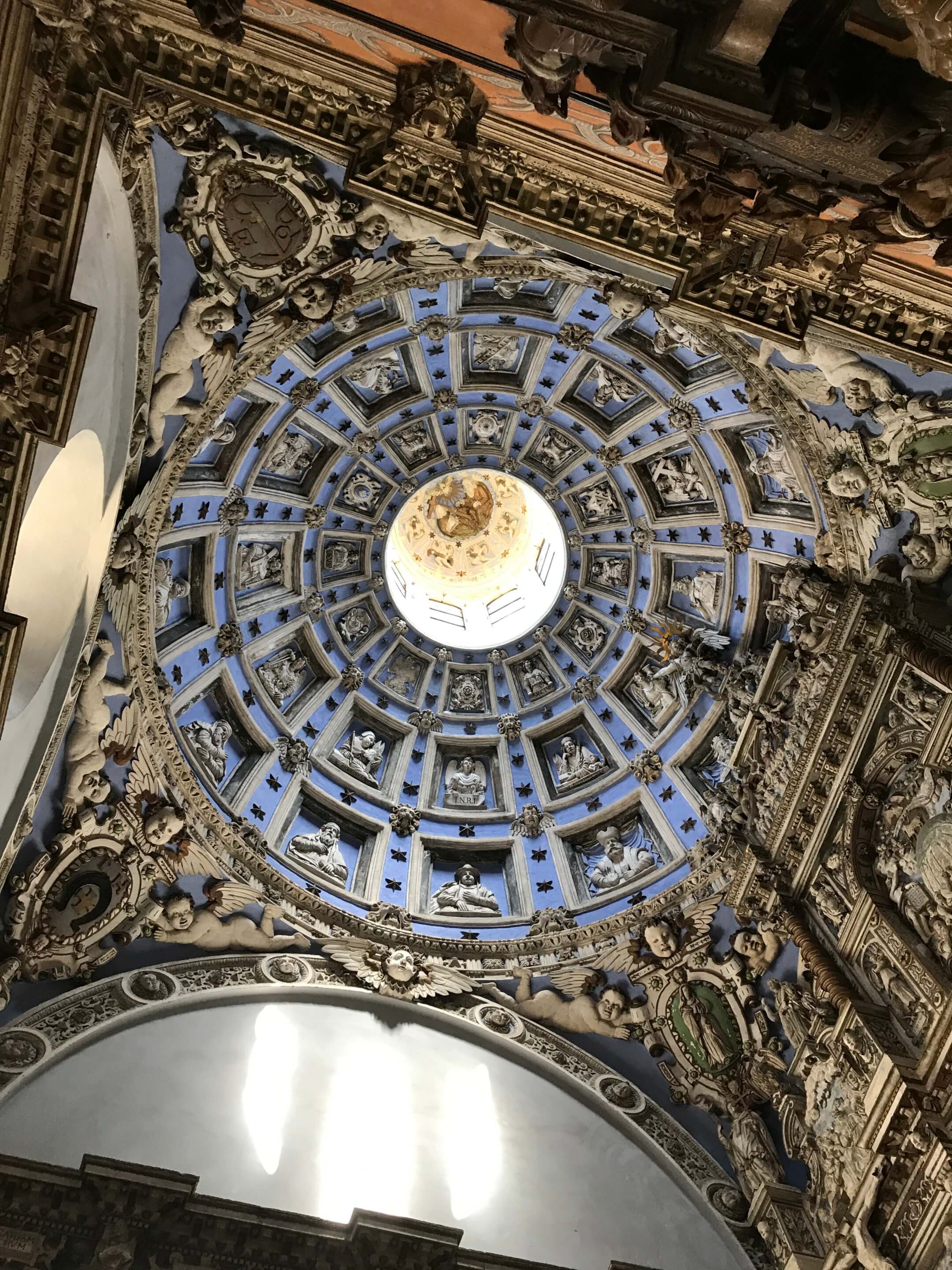 Looking up at an ornate blue chapel dome in ukraine