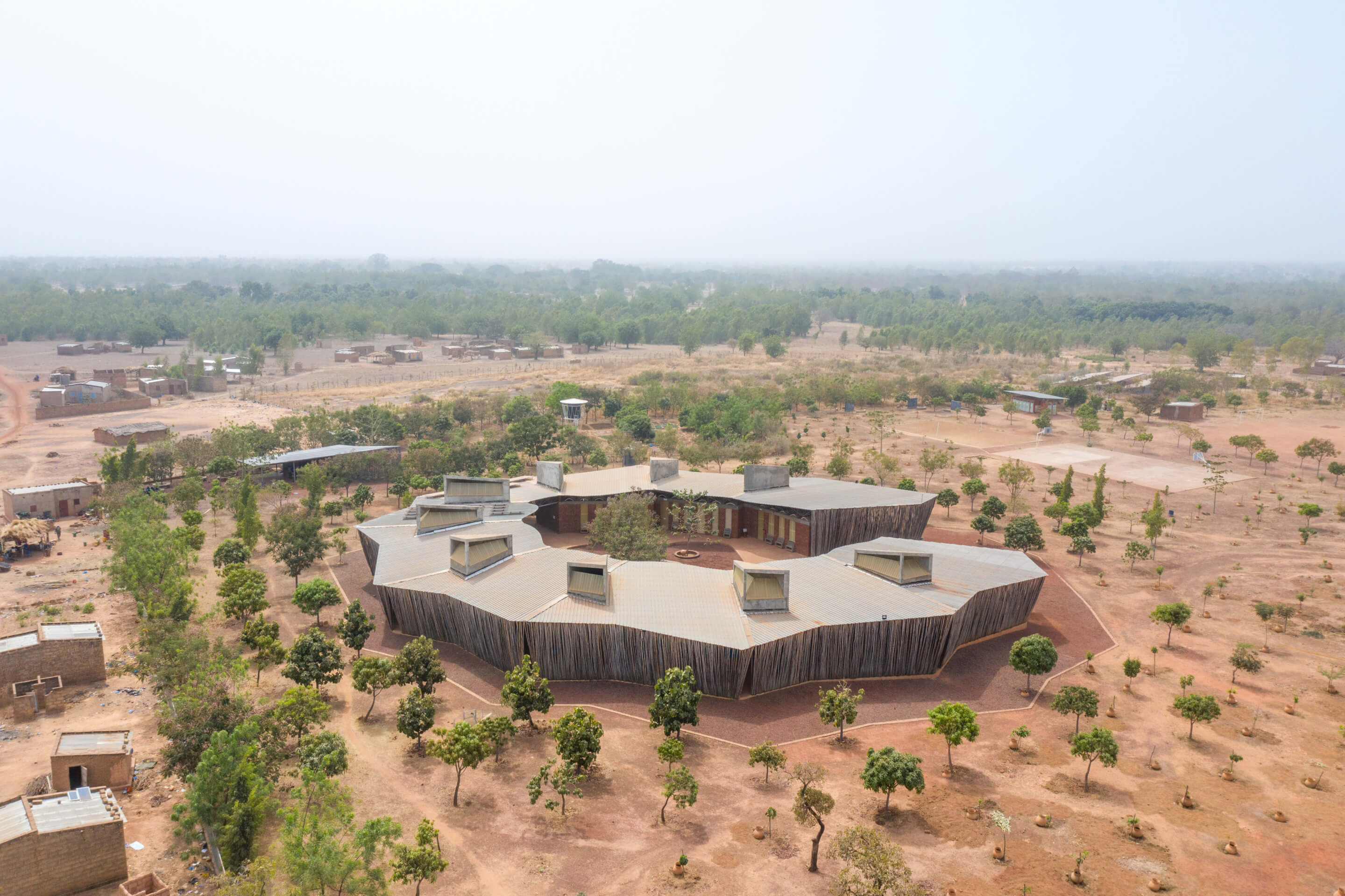 aerial view of a school campus in rural africa