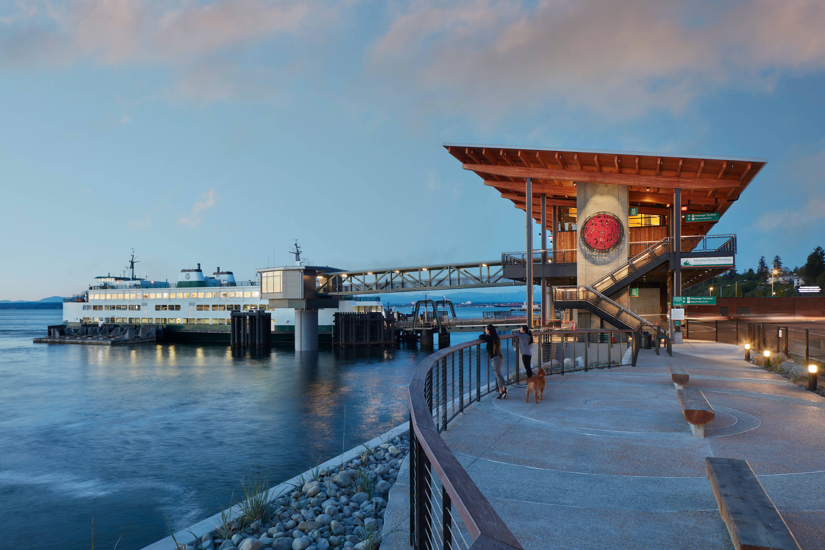 exterior view of a modern ferry terminal with native american motifs
