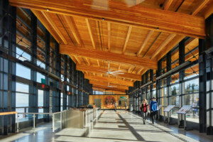a large transportation hall with a timber ceiling