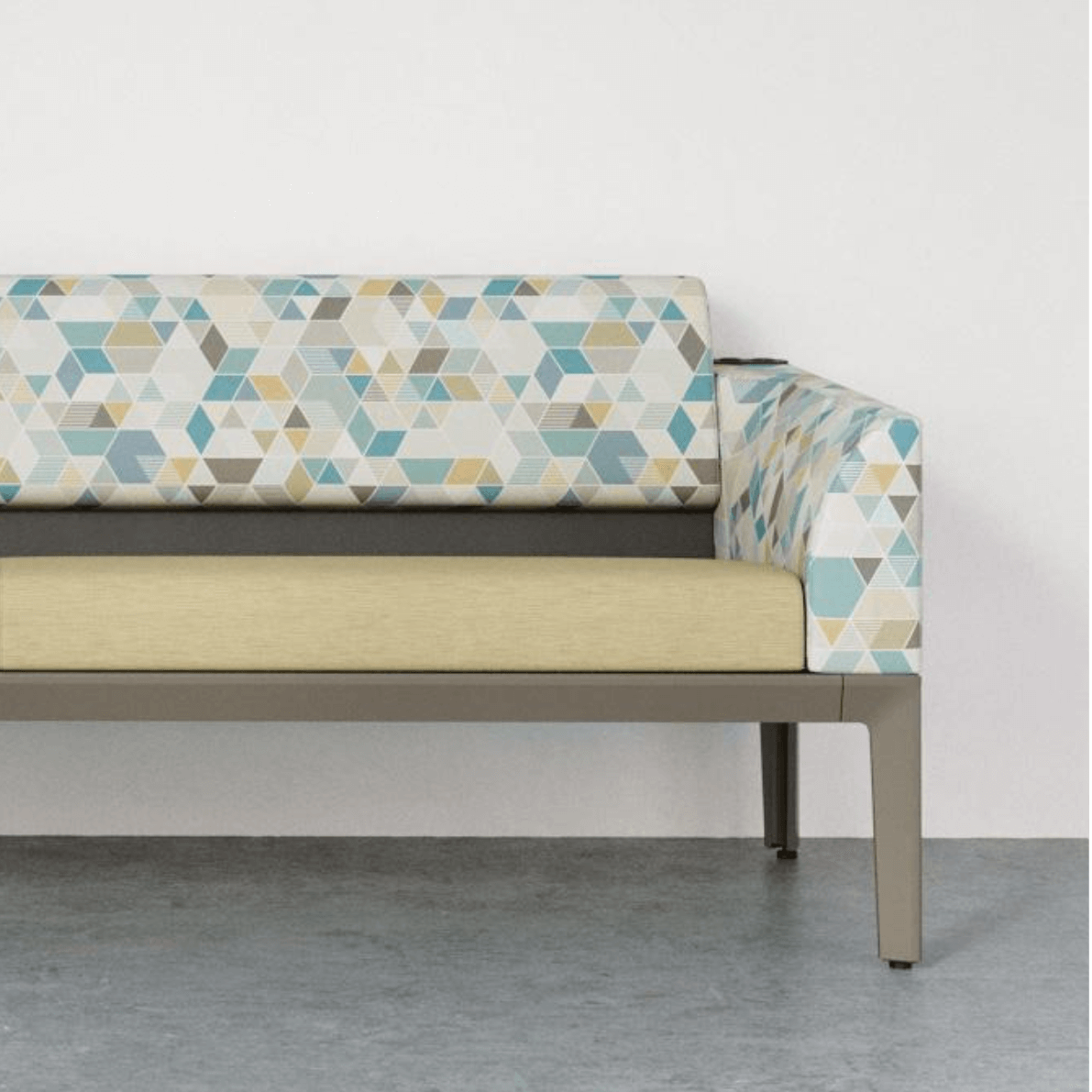 a couch with geometric upholstery