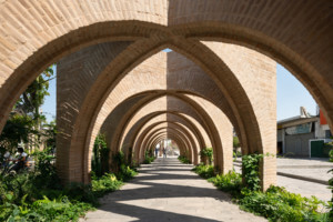 a series of brick archways designed by Estudio MMX