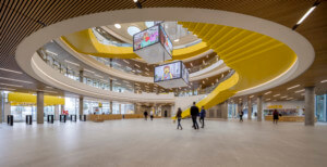 view of an atrium with a spiraling yellow staircase