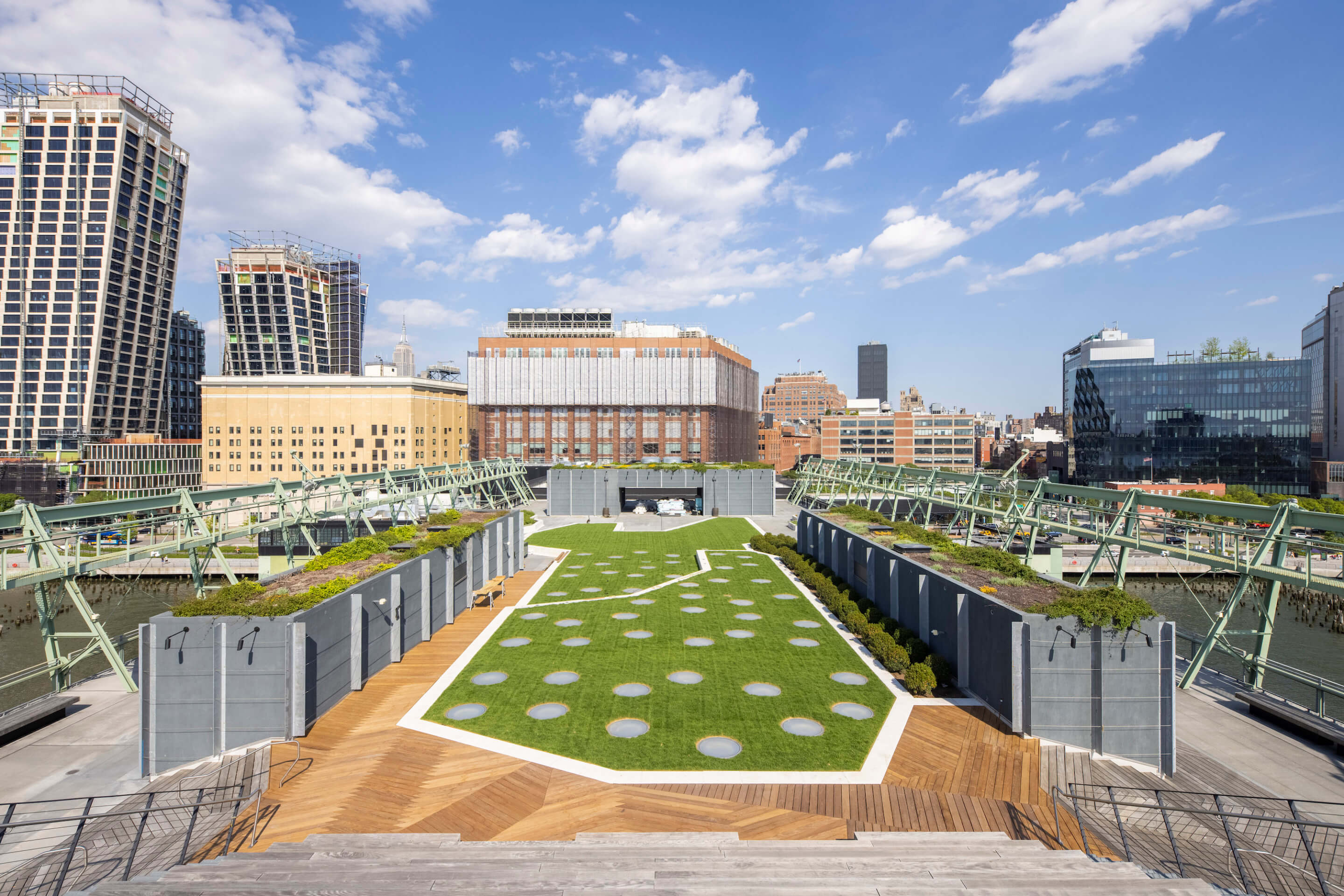 view of a patch of grass on a rooftop park