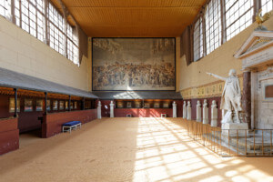 view of a historic indoor tennis court at the palace of versailles