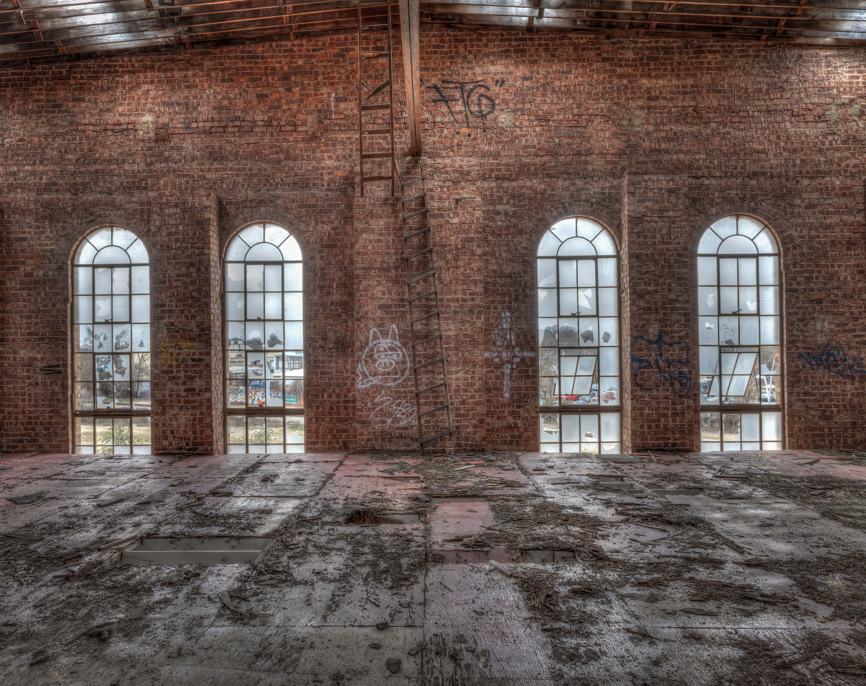windows in an empty warehouse space