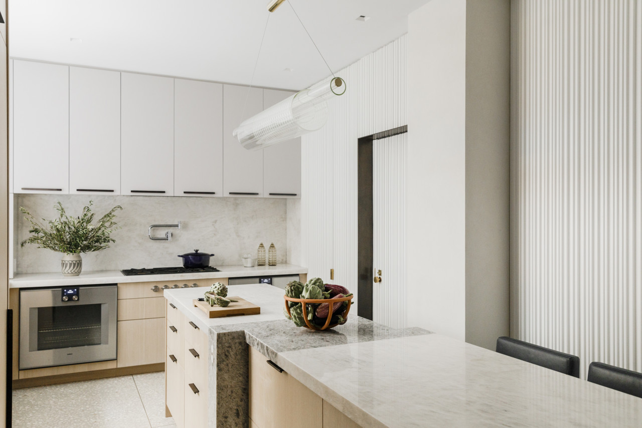 white kitchen with beige cabinets