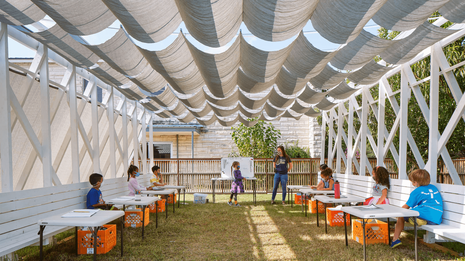 a shaded outdoor classroom space