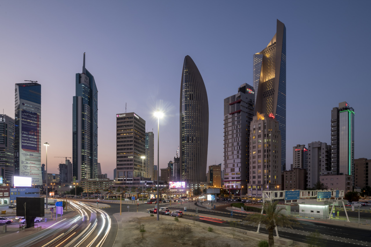 skyline of kuwait city's financial district at night