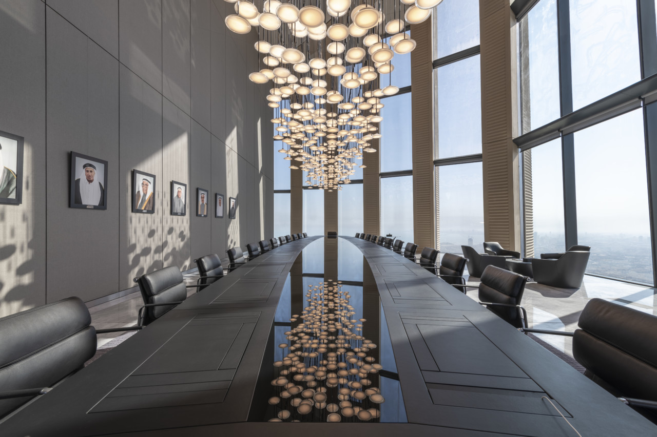 a corporate boardroom with large chandelier