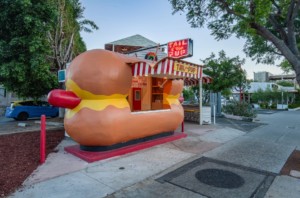 a hog dog-shaped hot dog stand