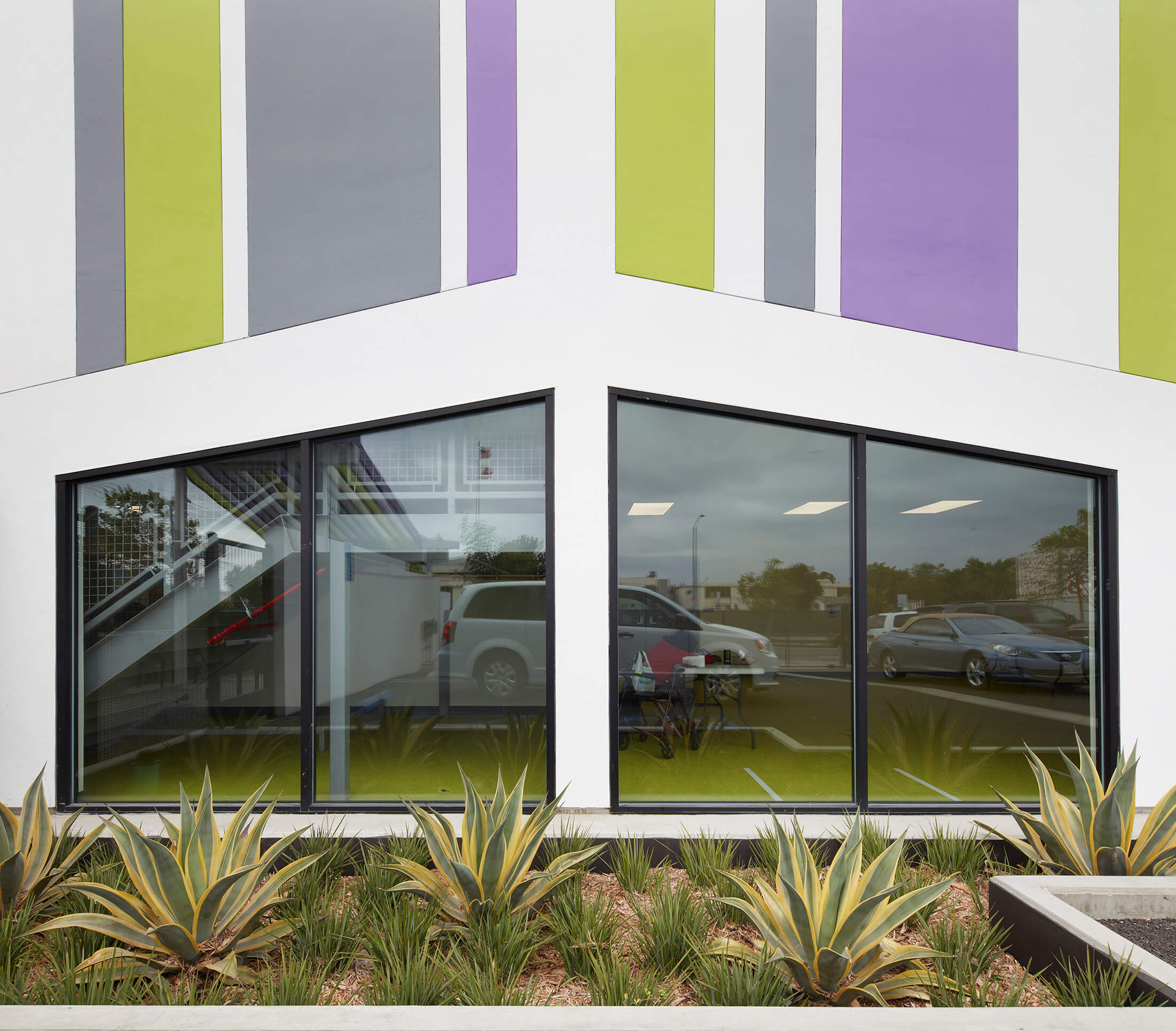 colorful facade of a supportive housing community in los angeles