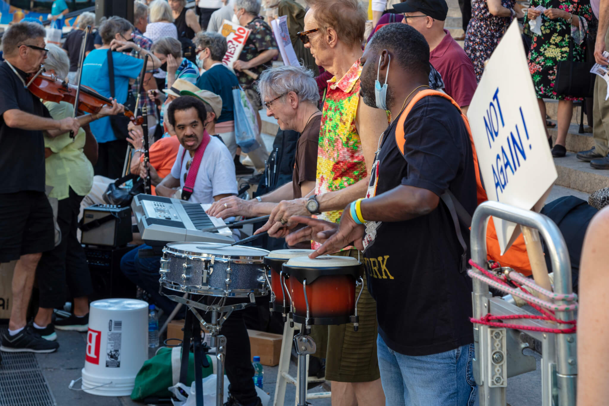 musicians performing at a protest