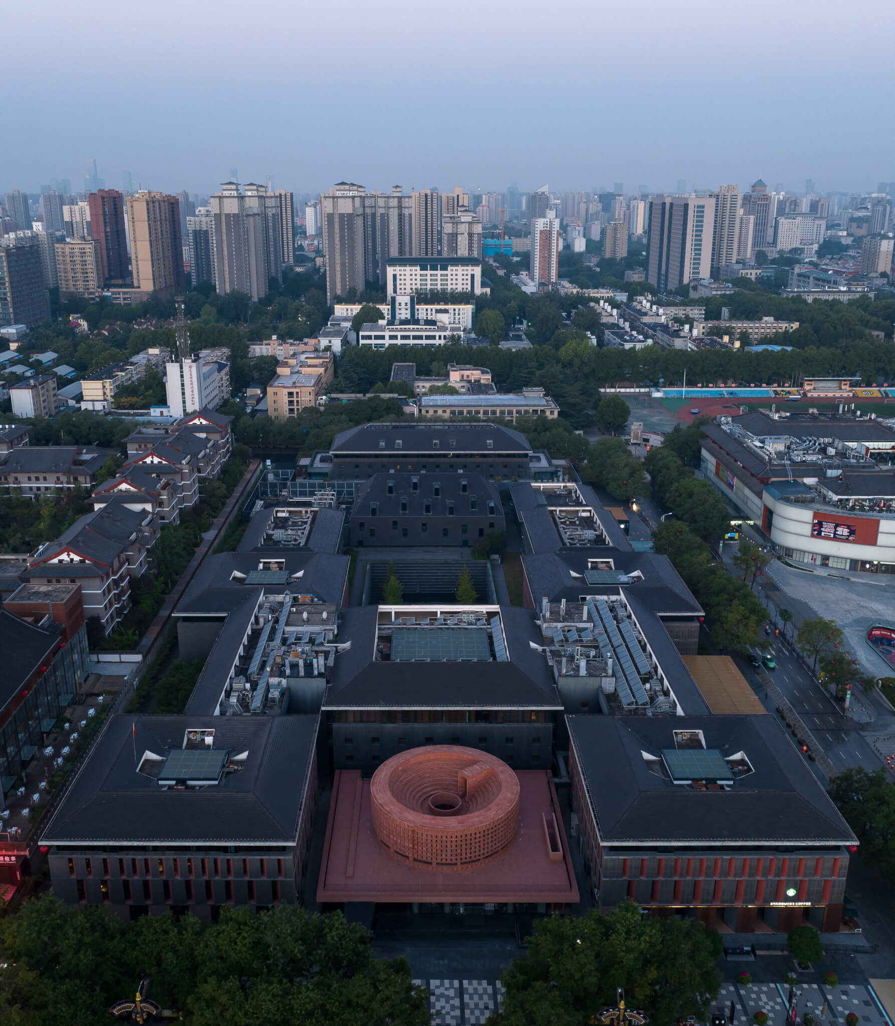 bird's eye view of a museum in an urban setting