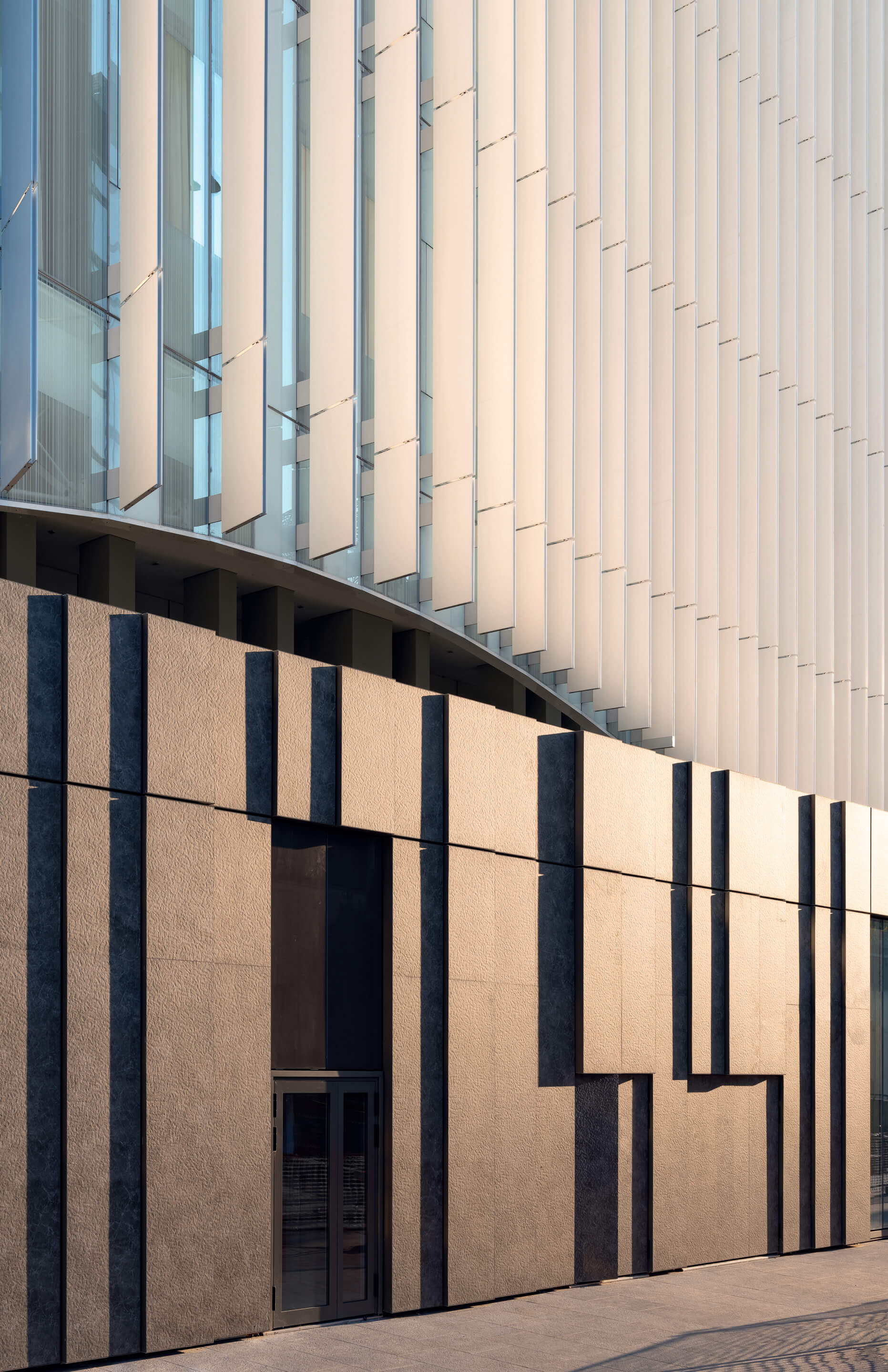 The Impact of Vertical Fins Façade on Building Performance: A New