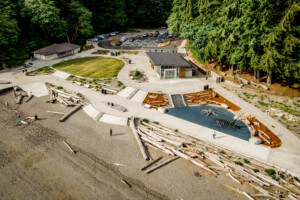 view from above a beachfront park on the puget sound with a pavilion and other facilities