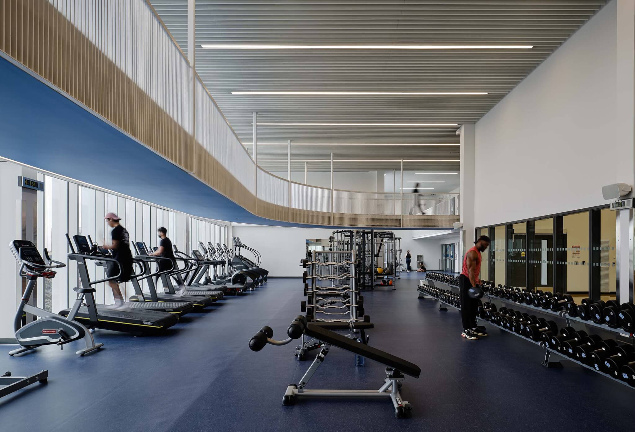 gym with suspended walkway