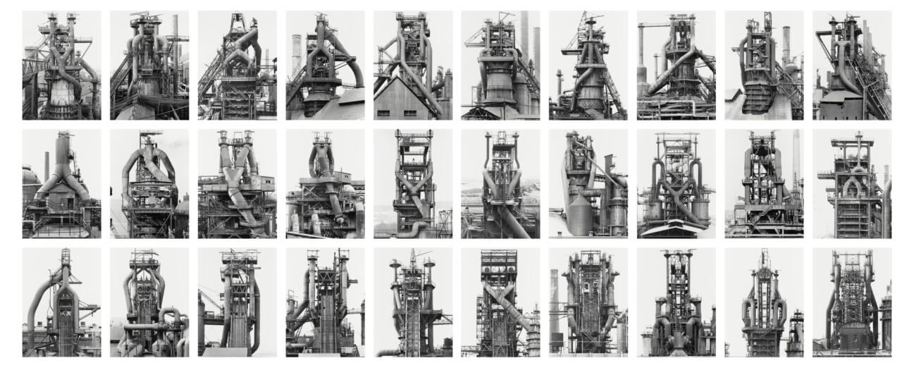 black and white photo of a series of blast furnaces